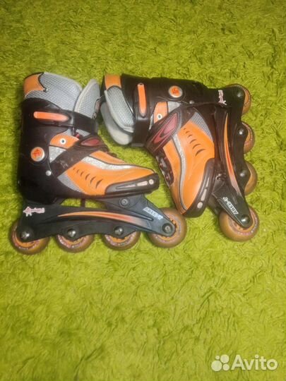 Роликовые коньки