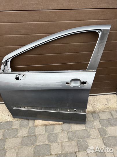 Дверь передняя левая Peugeot 308