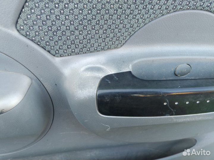 Обшивка двери передняя правая Chevrolet Aveo T200