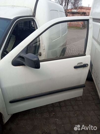 Двери Фольксваген Кадди II