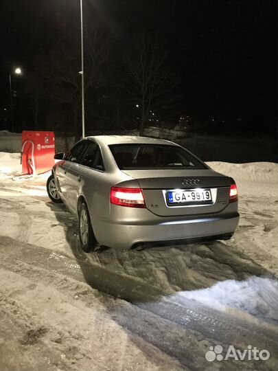 Заднее стекло на Audi A6 (C6)