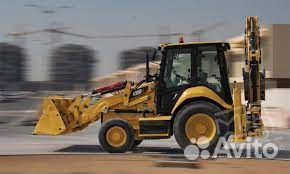 Услуги эксковатора-погрузчика