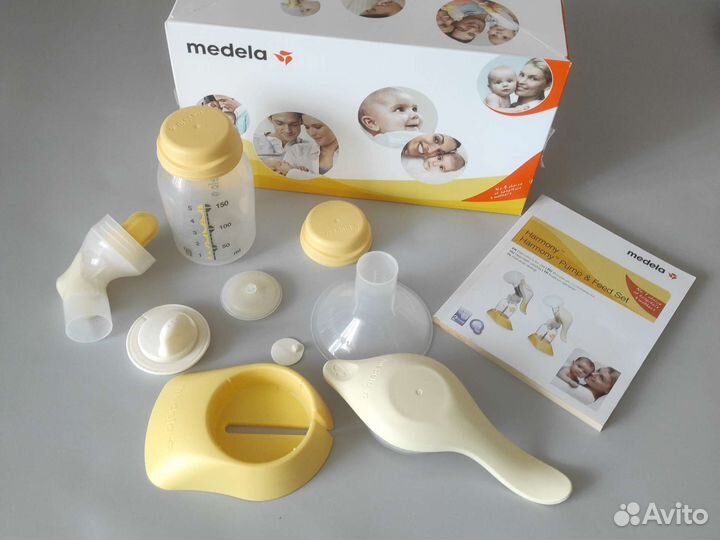 Молокоотсос medela с бутылочкой calma
