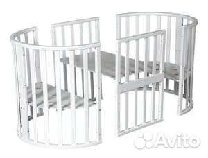 Детская кроватка с маятником