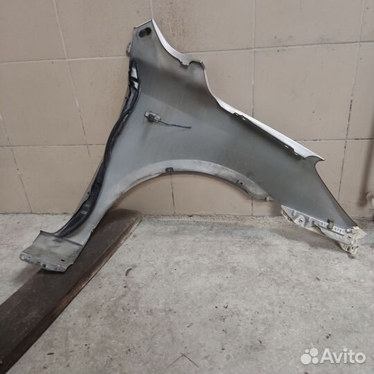 Крыло Мазда Демио рестайл