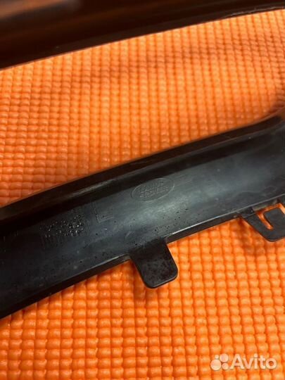 Накладка противотуманной фары передняя левая Land