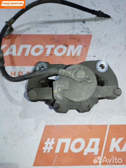 Суппорт тормозной передний правый Toyota Corolla