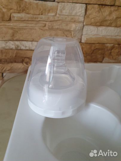 Молокоотсос электрический новый