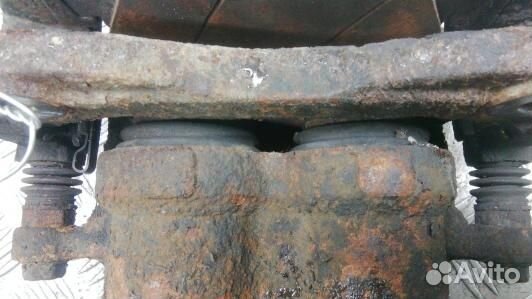 Суппорт тормозной передний правый ssang yong koran