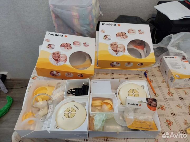 Молокоотсос medela электрический