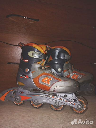 Роликовые коньки