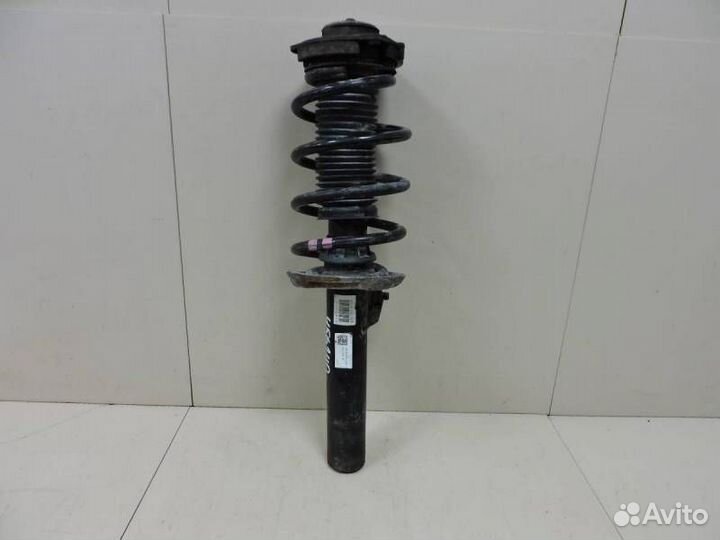 Амортизатор передний левый Skoda Yeti 2009