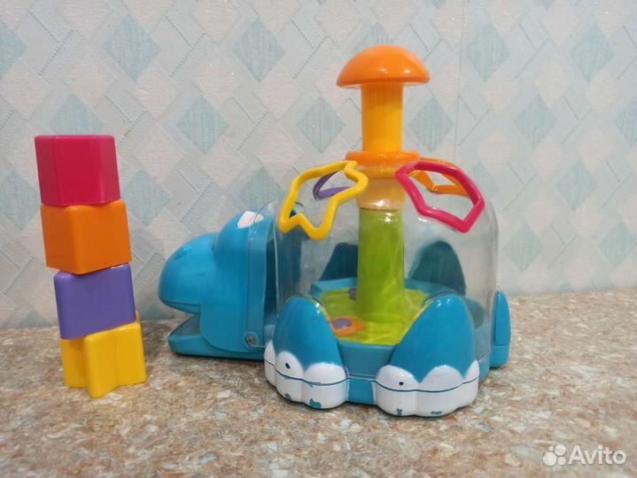 Игрушка бегемот развивающий