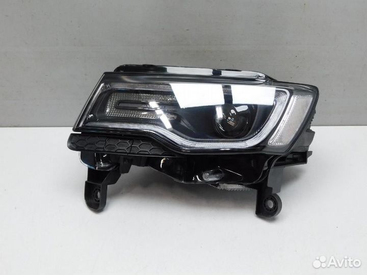 Фара левая Jeep Grand Cherokee