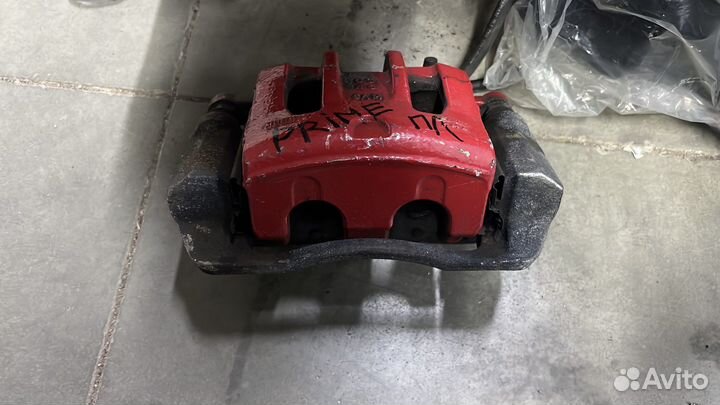 Стойка амортизатора Киа Соренто Прайм