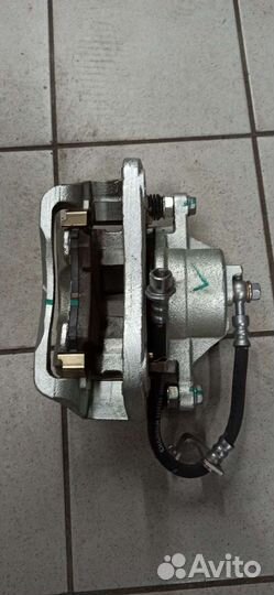 Суппорт тормозной передний Changan CS35 Plus