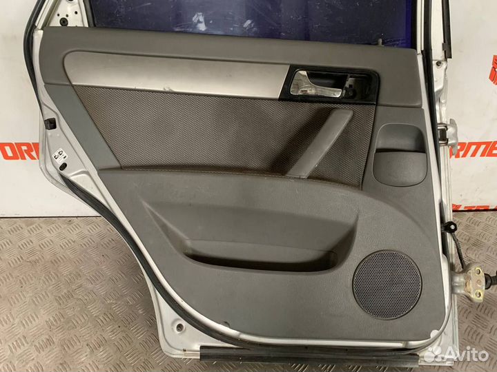 Обшивка двери задняя левая Шевроле Лачетти