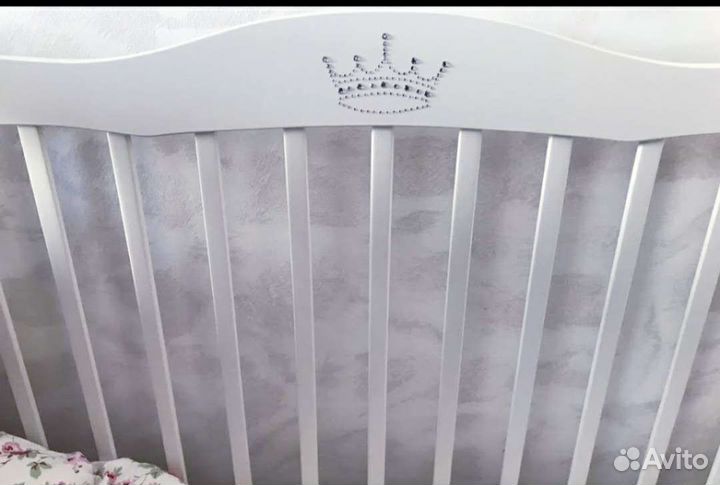 Детская кроватка с продольным маятником