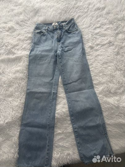 Джинсы клеш женские