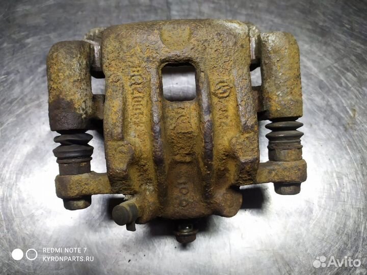 Суппорт тормозной задний правый Ssangyong Actyon