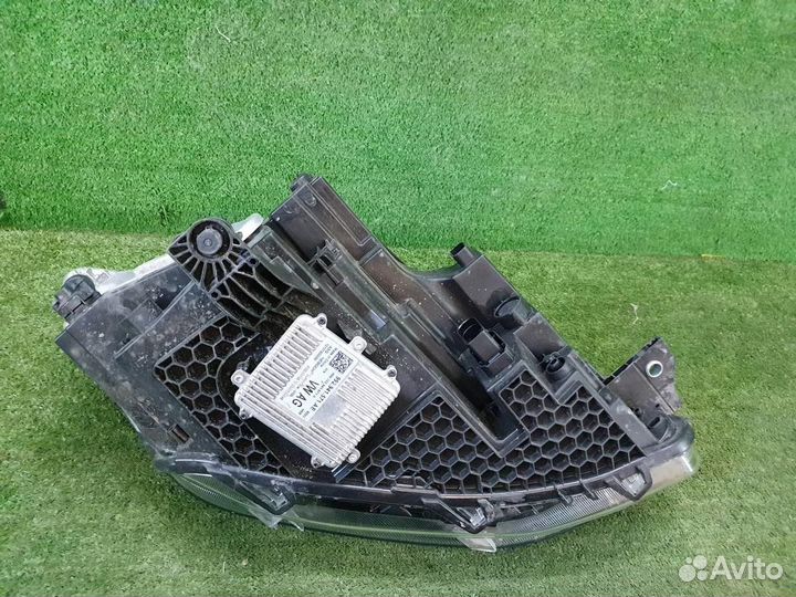 Фара левая Volkswagen Caddy