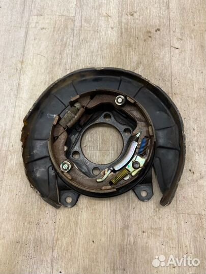 Механизм ручного тормоза задний левый Mitsubishi