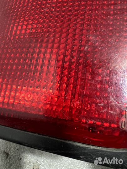 Фонарь заднего хода левый Toyota Land Cruiser 90 P