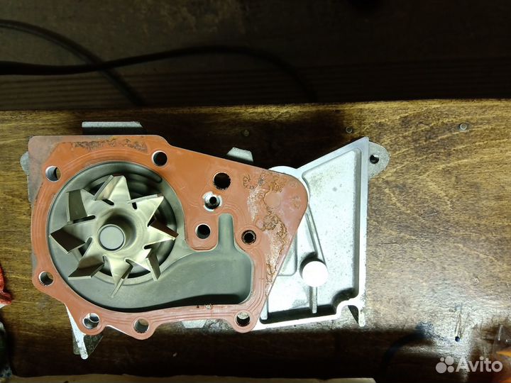 Помпа Renault logan 2 K4M