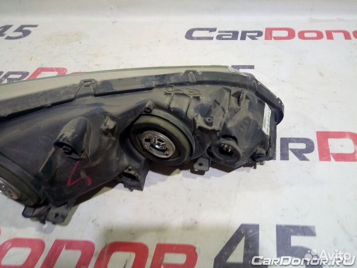 Фара головного света левая б/у для Honda Civic (33