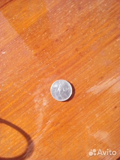 Монета Италия 50 лир 1979 г