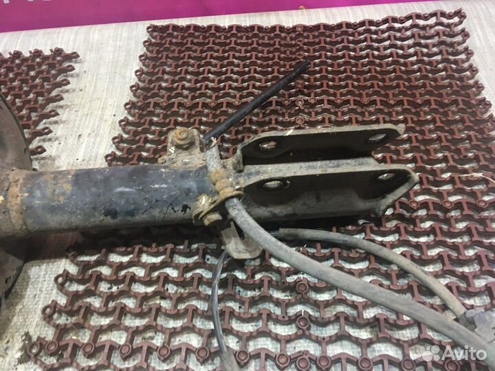 Амортизатор левый с пружиной зад Toyota Camry