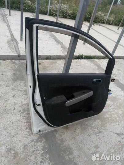 Дверь передняя левая Mazda Demio DE