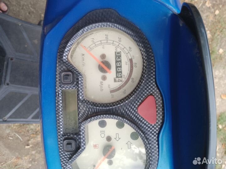 Скутер Омакс