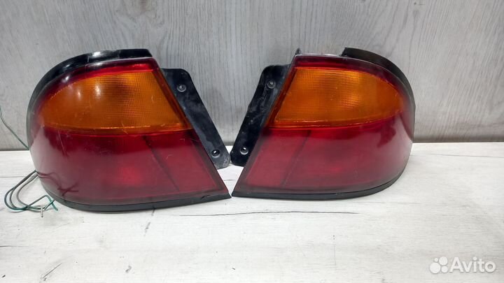 Фонарь задний Mazda 323 BA