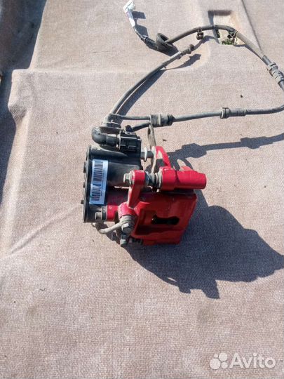 Суппорт задний левый Geely Coolray SX11