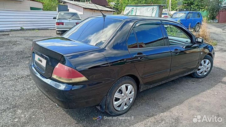 Mitsubishi Lancer, 2004