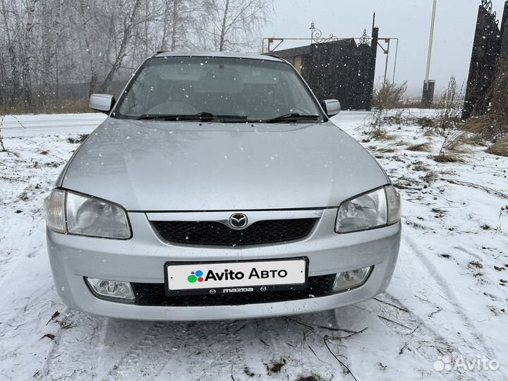 Mazda Familia 1.8 AT, 1999, 260 000 км