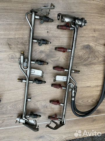 Топливная рейка с форсунками М104 w124 w210