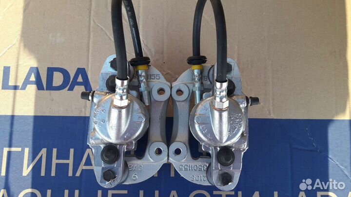 Суппорта тормозные 08 в сборе передние новые пара