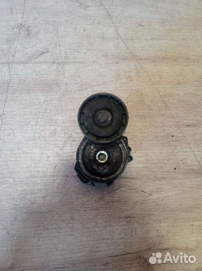 Ролик- натяжитель ремня грм Ford Kuga 1