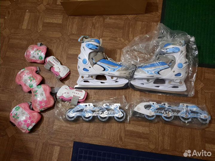 Роликовые коньки