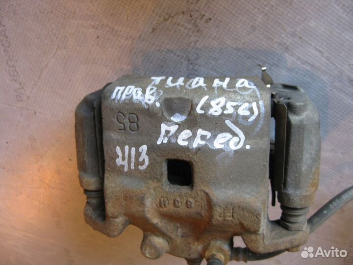 Суппорт тормозной передний Ниссан Теана J32