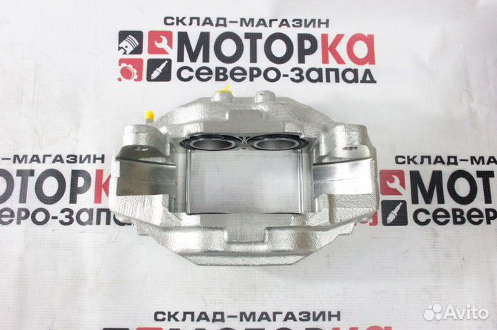 Суппорт тормозной передний правый Toyota Land