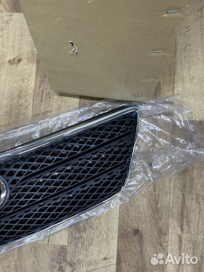 Решетка радиатора Toyota Corolla 120