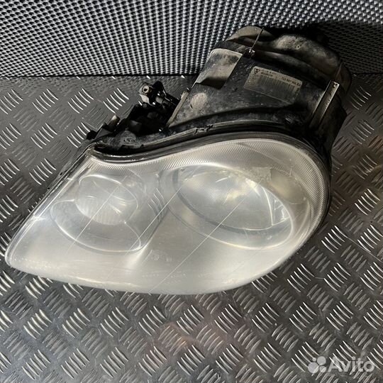 Фара левая Porsche Cayenne