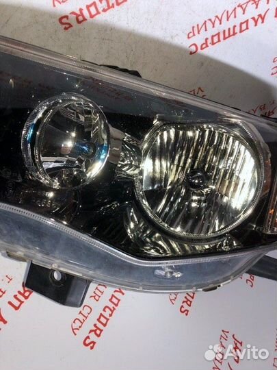 Фара ксеноновая левая Mitsubishi Outlander Xl XL