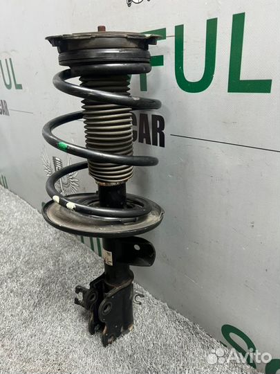 Стойка амортизатора передняя левая Nissan Teana