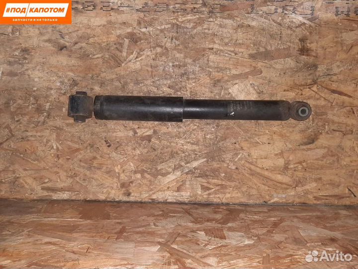 Стойка амортизатора задняя Nissan Qashqai