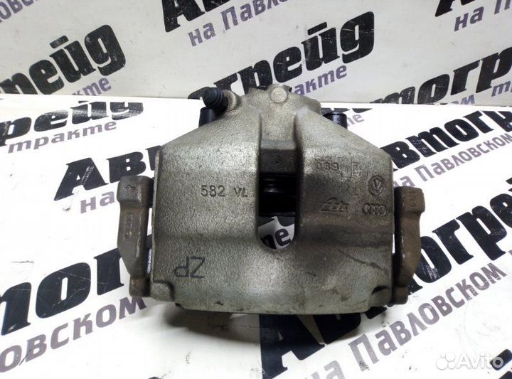 Суппорт тормозной передний правый Volkswagen