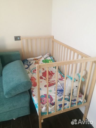 Детская кроватка маятниковая